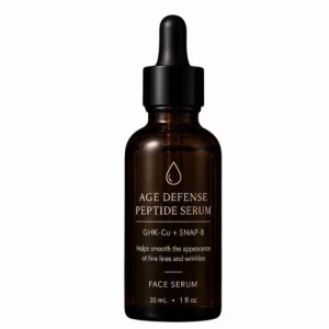 Luxury peptide serum bottle with gold accents on a clean white background